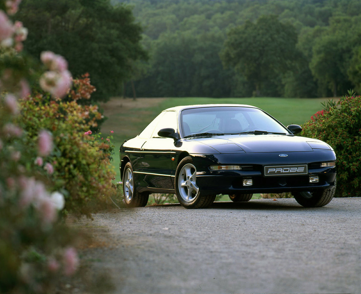 This archival image documents the 1993 Ford Probe 24v with scenic flowers in Nice and is preserved in the Ford Heritage Vault as part of Ford Motor Company's historic photographic archive. Free for personal, non-commercial use. Ford Heritage Vault...