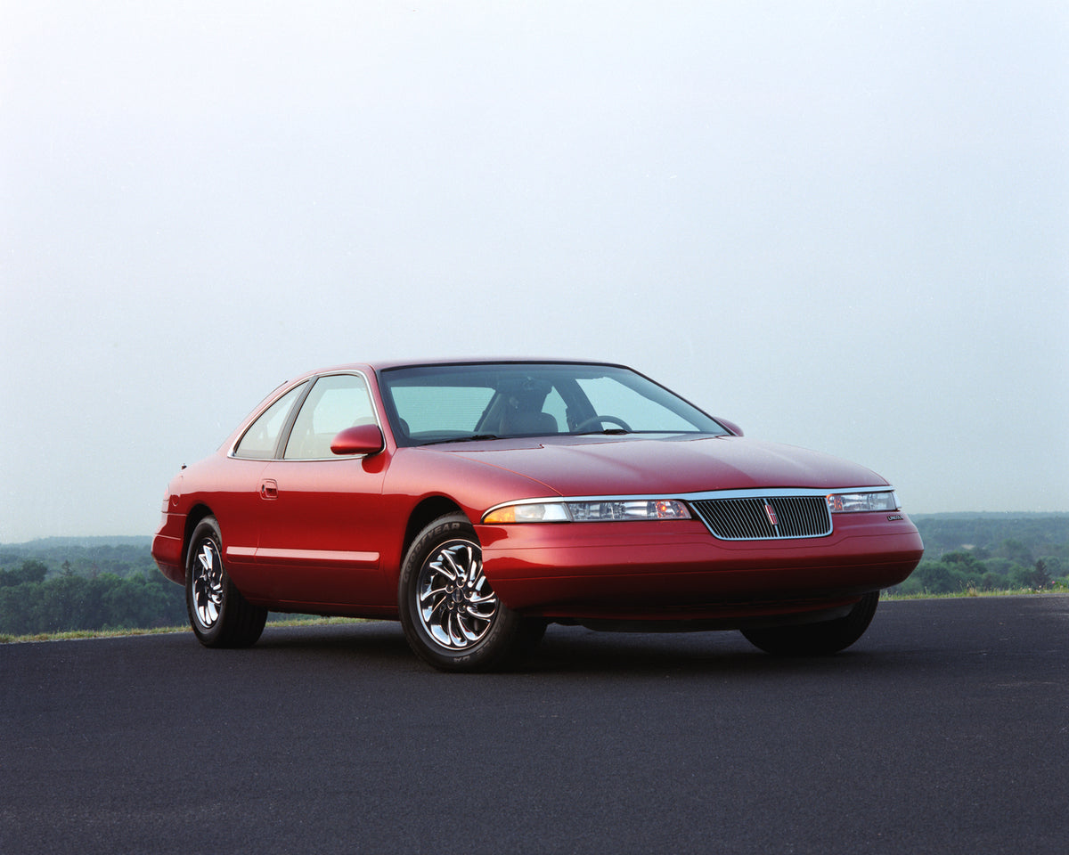 This archival image documents the 1996 Lincoln Mark VIII and is preserved in the Ford Heritage Vault as part of Ford Motor Company's historic photographic archive. Free for personal, non-commercial use. Ford Heritage Vault reference AR-2008-8.1.1....