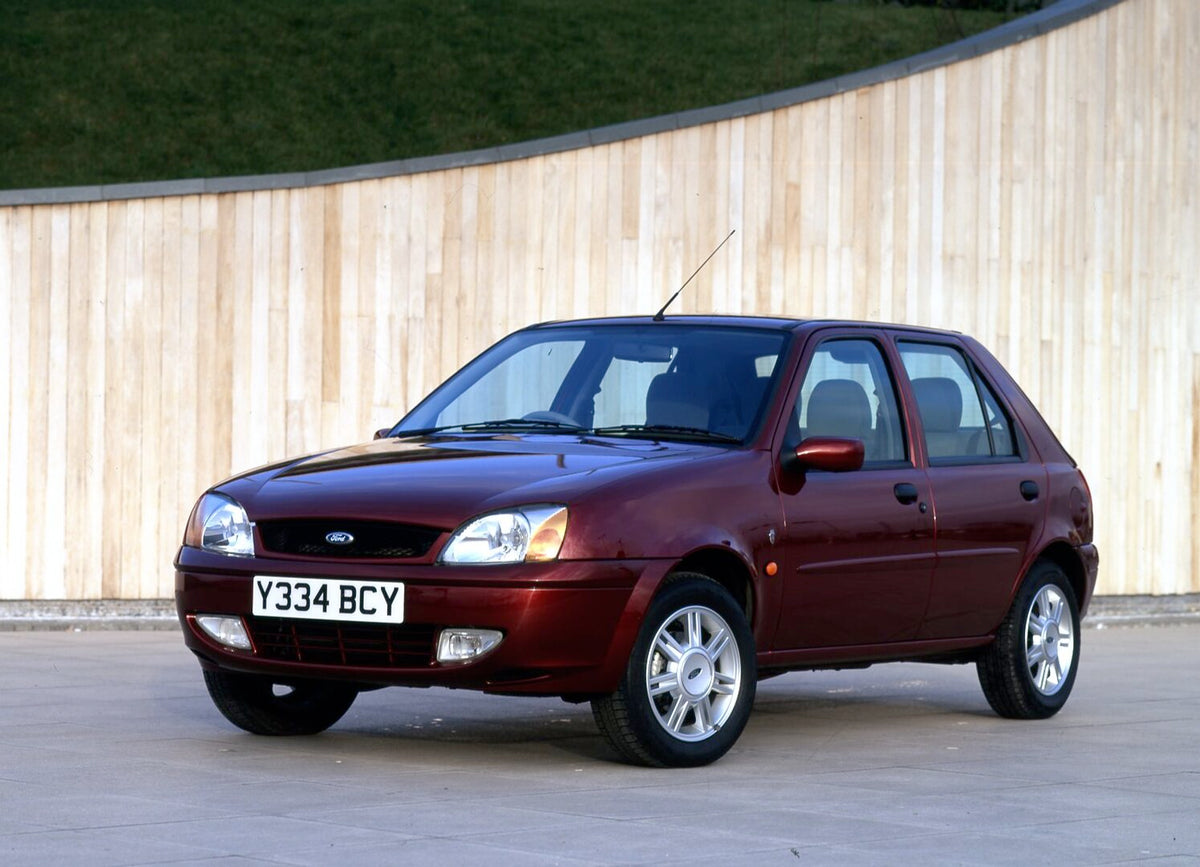 This archival image documents the 2001 Ford Fiesta Mark V Ghia in front of wood paneled wall and is preserved in the Ford Heritage Vault as part of Ford Motor Company's historic photographic archive. Free for personal, non-commercial use. Ford Her...