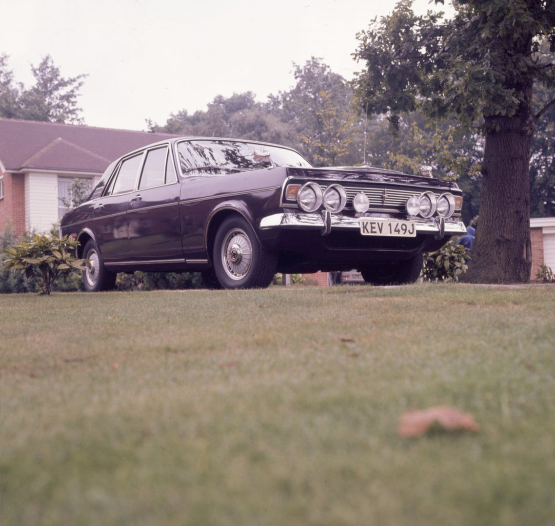 This archival image documents the 1970 Ford Zodiac Mark IV Executive with house and trees and is preserved in the Ford Heritage Vault as part of Ford Motor Company's historic photographic archive. Free for personal, non-commercial use. Ford Herita...