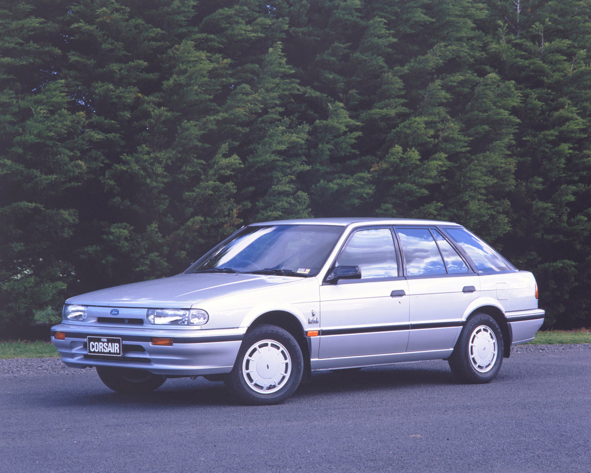 This archival image documents the 1990 Ford UA Corsair Liftback Sedan Passenger Side Front End View in Driveway FAP-2011-3 and is preserved in the Ford Heritage Vault as part of Ford Motor Company's historic photographic archive. Free for personal...