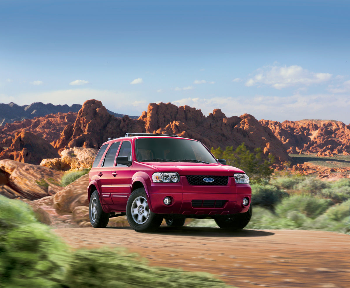 This archival image documents the 2006 Ford Escape in front of mountains and is preserved in the Ford Heritage Vault as part of Ford Motor Company's historic photographic archive. Free for personal, non-commercial use. Ford Heritage Vault referenc...