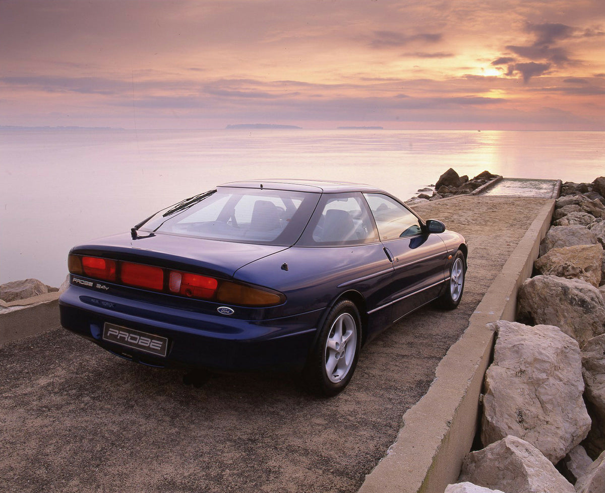 This archival image documents the 1993 Ford Probe 24v Mark II near water and is preserved in the Ford Heritage Vault as part of Ford Motor Company's historic photographic archive. Free for personal, non-commercial use. Ford Heritage Vault referenc...
