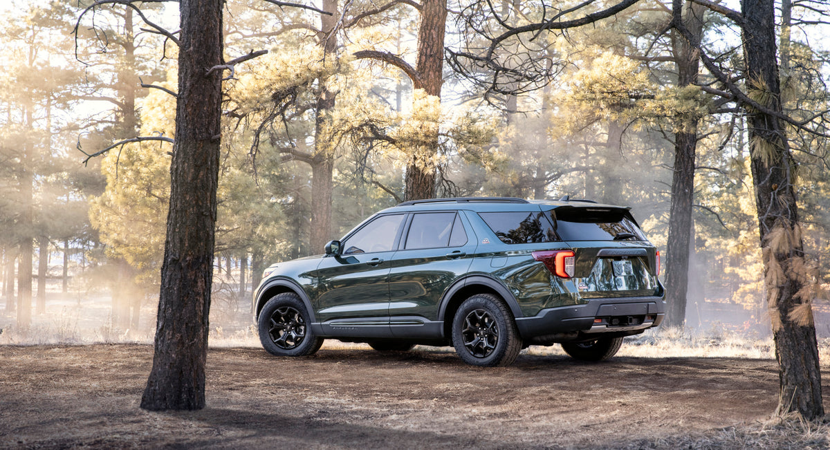 This archival image documents the 2021 Ford Explorer Timberline rear view in scenic forest and is preserved in the Ford Heritage Vault as part of Ford Motor Company's historic photographic archive. Free for personal, non-commercial use. Ford Herit...