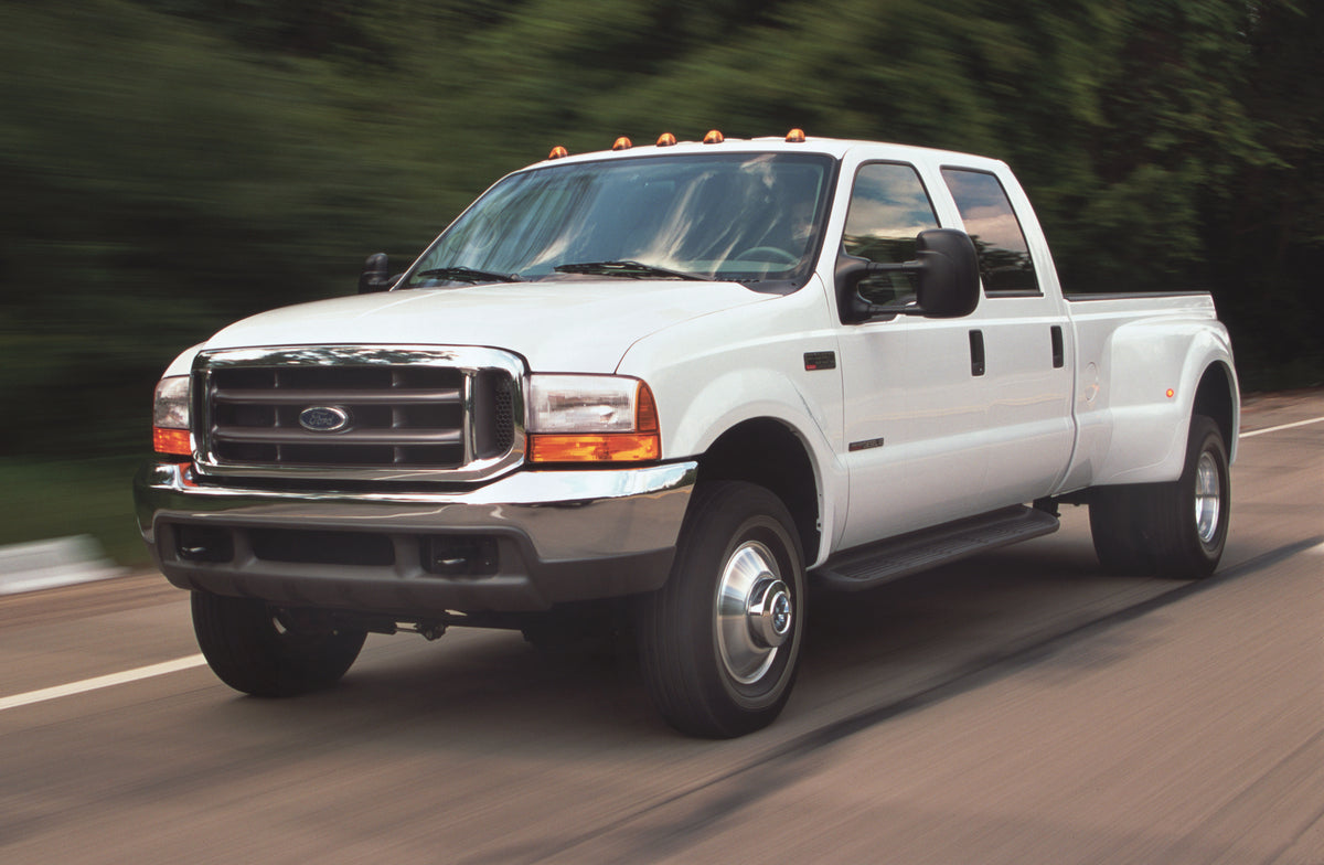 This archival image documents the 2001 Ford F-350 Super Duty Crew Cab and is preserved in the Ford Heritage Vault as part of Ford Motor Company's historic photographic archive. Free for personal, non-commercial use. Ford Heritage Vault reference A...