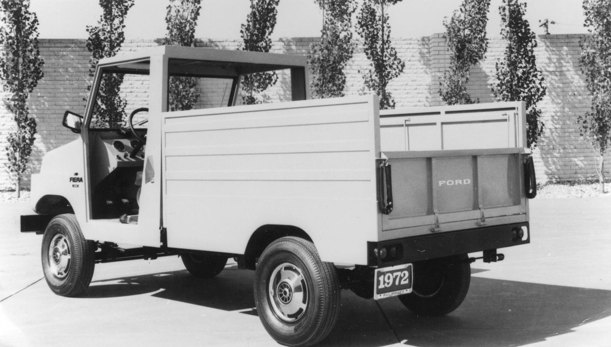 This archival image documents the 1972 Ford Fiera rear view with scenic trees and is preserved in the Ford Heritage Vault as part of Ford Motor Company's historic photographic archive. Free for personal, non-commercial use. Ford Heritage Vault ref...