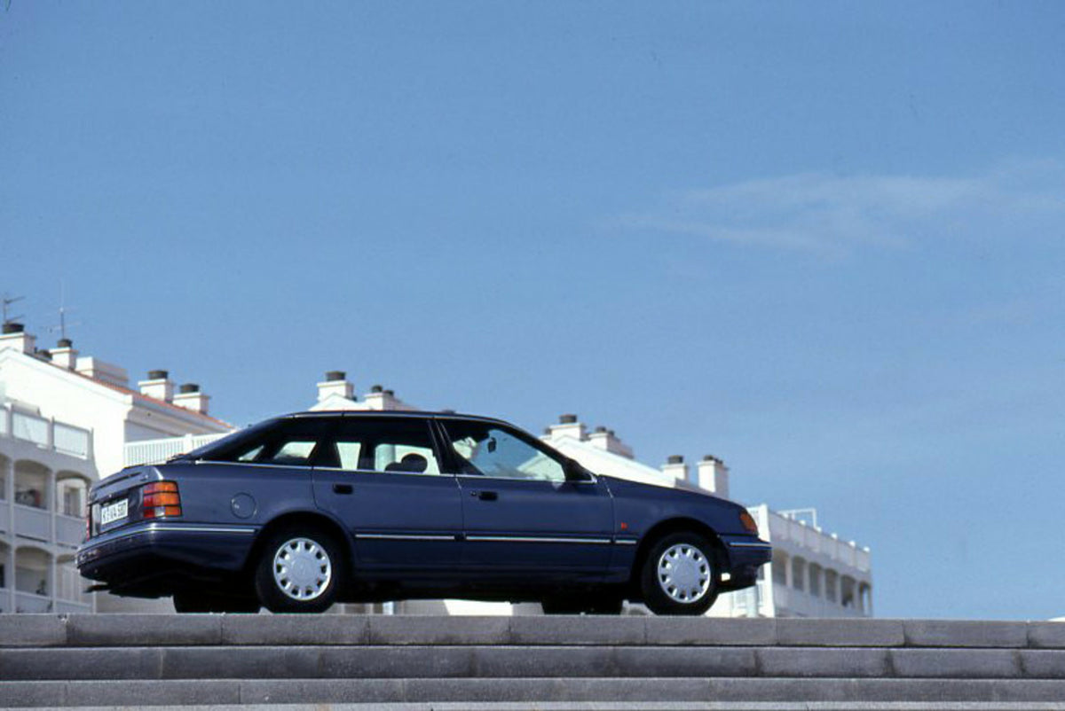This archival image documents the 1991 Ford Scorpio Mark I side view with building in background and is preserved in the Ford Heritage Vault as part of Ford Motor Company's historic photographic archive. Free for personal, non-commercial use. Ford...