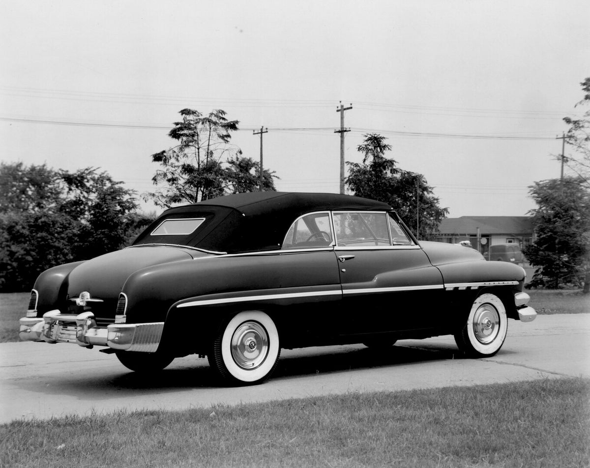 This archival image documents the 1951 Monarch Convertible rear view on scenic road with trees AR-2007-5 and is preserved in the Ford Heritage Vault as part of Ford Motor Company's historic photographic archive. Free for personal, non-commercial u...