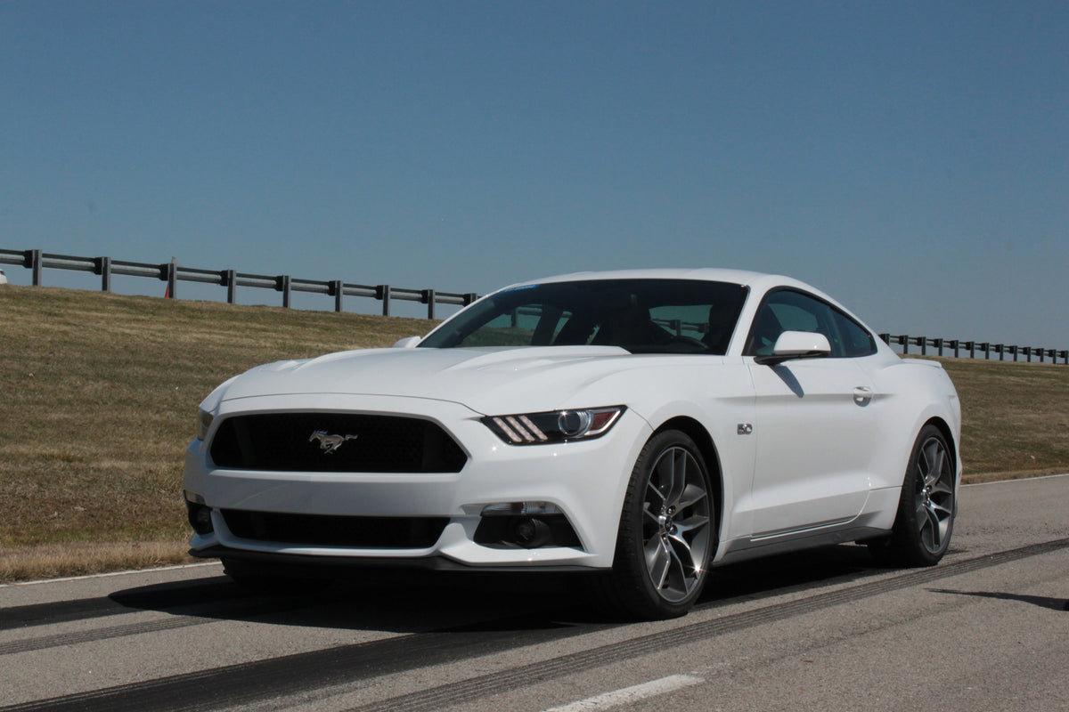 This archival image documents the 2014 Ford Mustang and is preserved in the Ford Heritage Vault as part of Ford Motor Company's historic photographic archive. Free for personal, non-commercial use. Ford Heritage Vault reference AR-2008-8.1.4.1664.