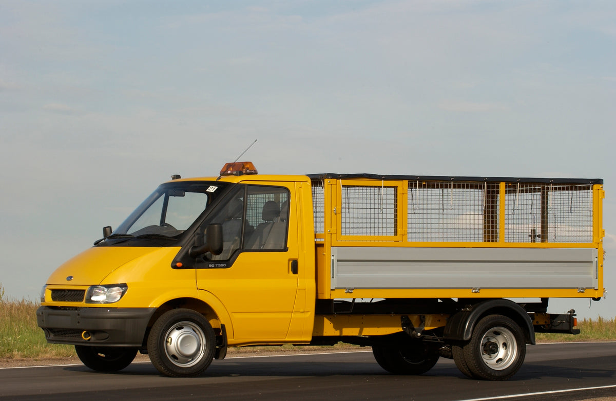 This archival image documents the 2003 Ford Transit Mark IV conversion with wire container on scenic road and is preserved in the Ford Heritage Vault as part of Ford Motor Company's historic photographic archive. Free for personal, non-commercial ...