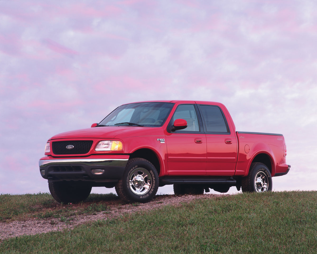 This archival image documents the 2001 Ford F-150 Super Crew pickup truck and is preserved in the Ford Heritage Vault as part of Ford Motor Company's historic photographic archive. Free for personal, non-commercial use. Ford Heritage Vault referen...