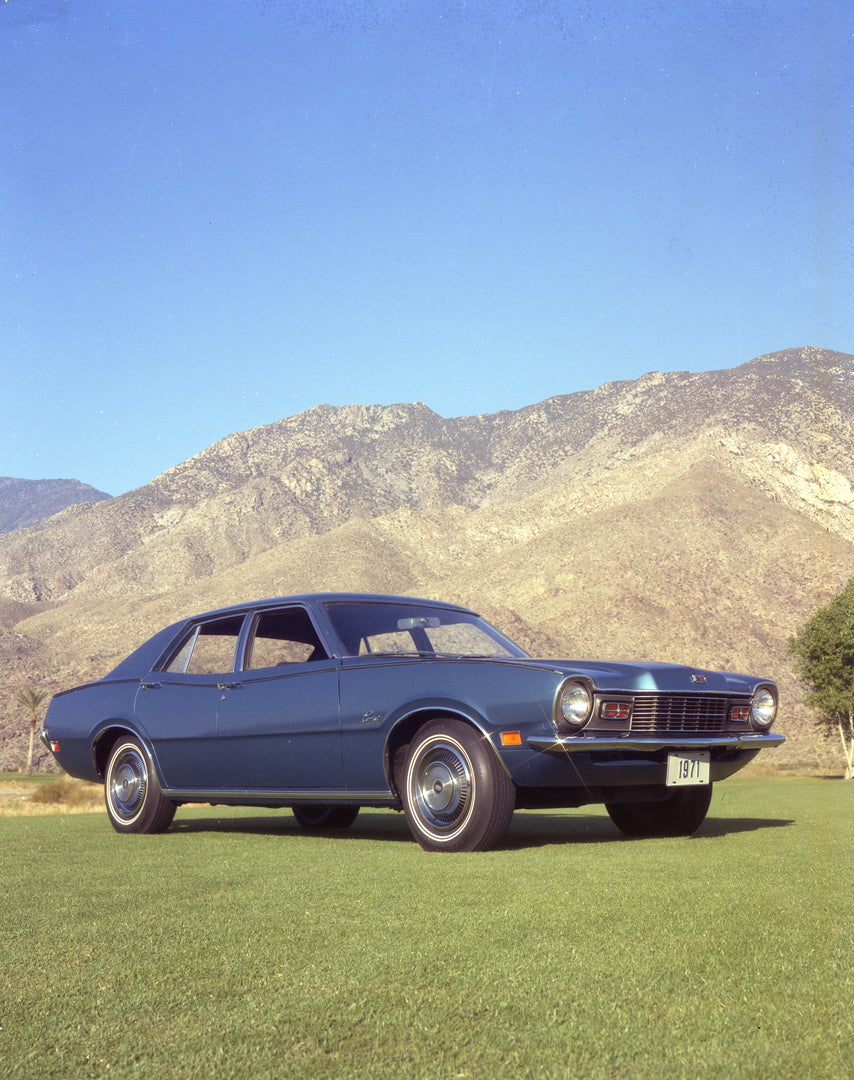 This archival image documents the 1971 Mercury Comet four-door with Mountains in Background and is preserved in the Ford Heritage Vault as part of Ford Motor Company's historic photographic archive. Free for personal, non-commercial use. Ford Heri...