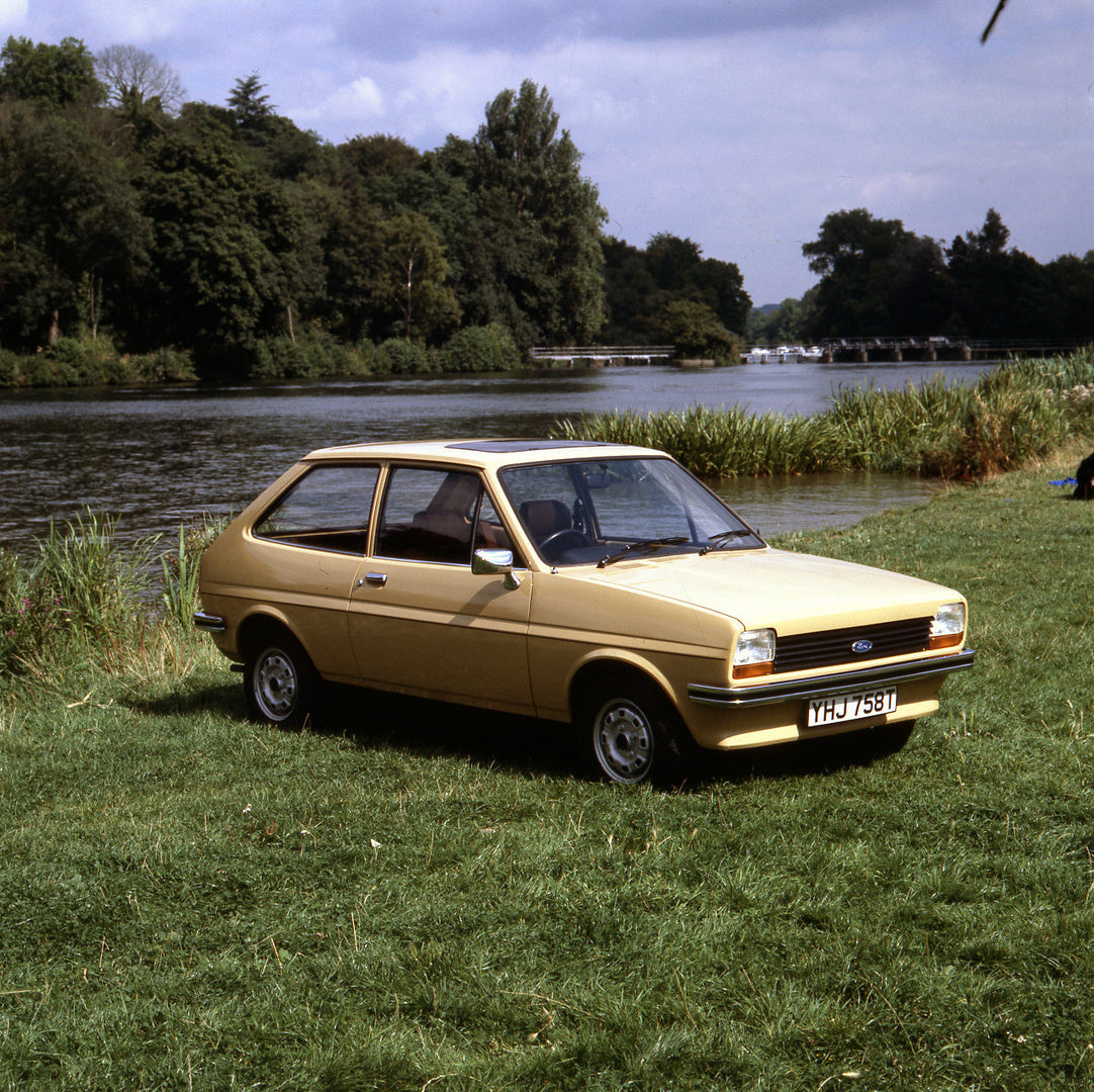 This archival image documents the 1978 Ford Fiesta Mark I L near scenic river with trees and is preserved in the Ford Heritage Vault as part of Ford Motor Company's historic photographic archive. Free for personal, non-commercial use. Ford Heritag...