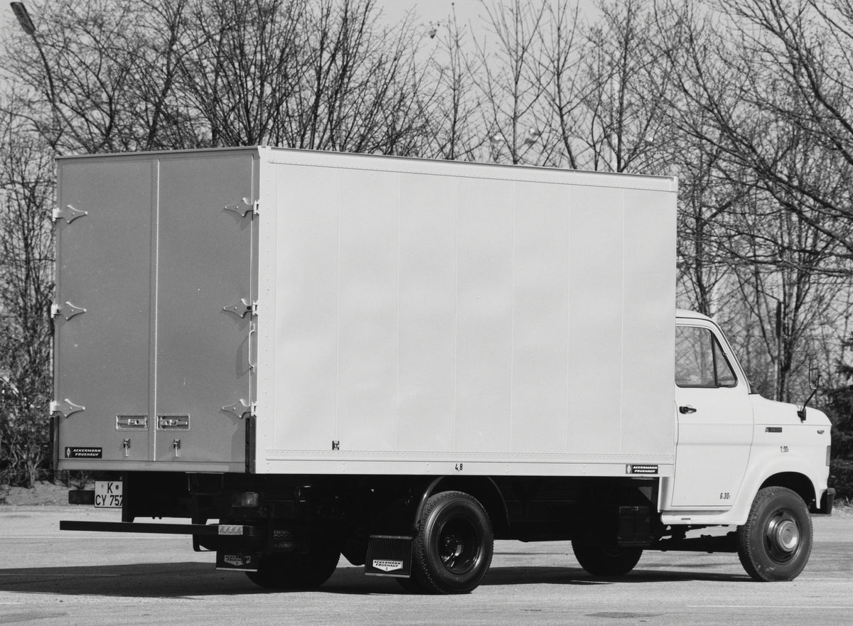 This archival image documents the 1970 Ford A-Series Truck rear view with scenic trees and is preserved in the Ford Heritage Vault as part of Ford Motor Company's historic photographic archive. Free for personal, non-commercial use. Ford Heritage ...