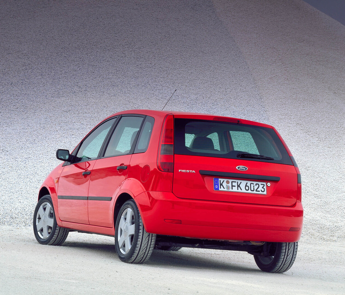 This archival image documents the 2002 Ford Fiesta Mark VI rear view in front of gravel pit and is preserved in the Ford Heritage Vault as part of Ford Motor Company's historic photographic archive. Free for personal, non-commercial use. Ford Heri...