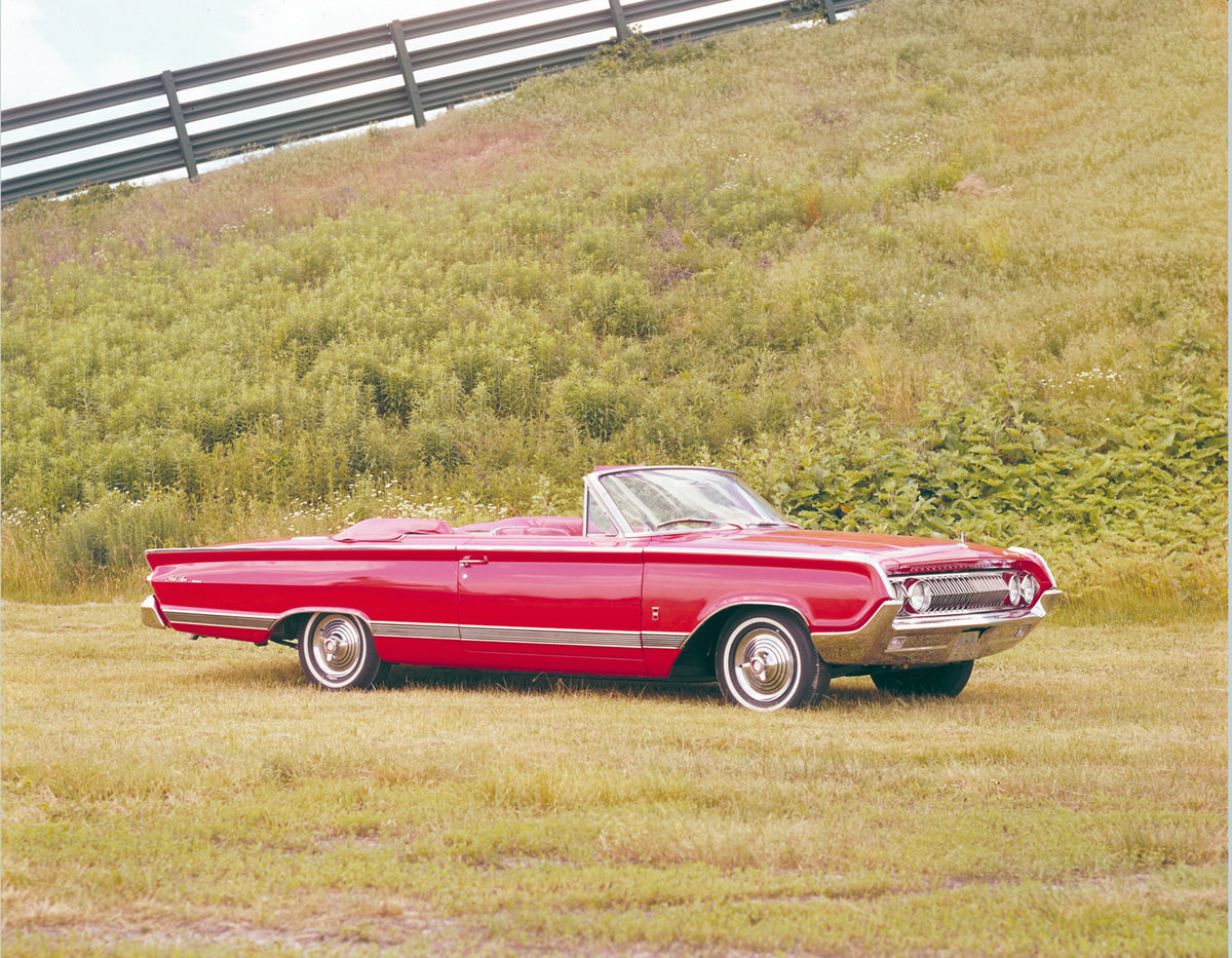 This archival image documents the 1964 Mercury Park Lane convertible Top Down in Grass Field and is preserved in the Ford Heritage Vault as part of Ford Motor Company's historic photographic archive. Free for personal, non-commercial use. Ford Her...