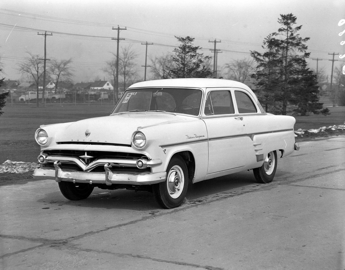 This archival image documents the 1954 Meteor Niagara Coupe on scenic road with trees AR-2007-5 and is preserved in the Ford Heritage Vault as part of Ford Motor Company's historic photographic archive. Free for personal, non-commercial use. Ford ...