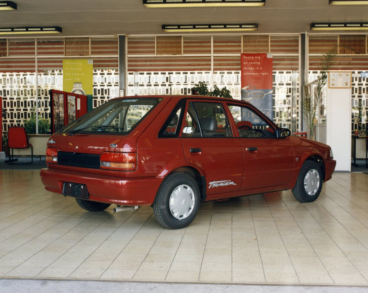 This archival image documents the 1998 Ford Tracer 1.3i Plus display AR-2002-210284.7.27.2 and is preserved in the Ford Heritage Vault as part of Ford Motor Company's historic photographic archive. Free for personal, non-commercial use. Ford Herit...