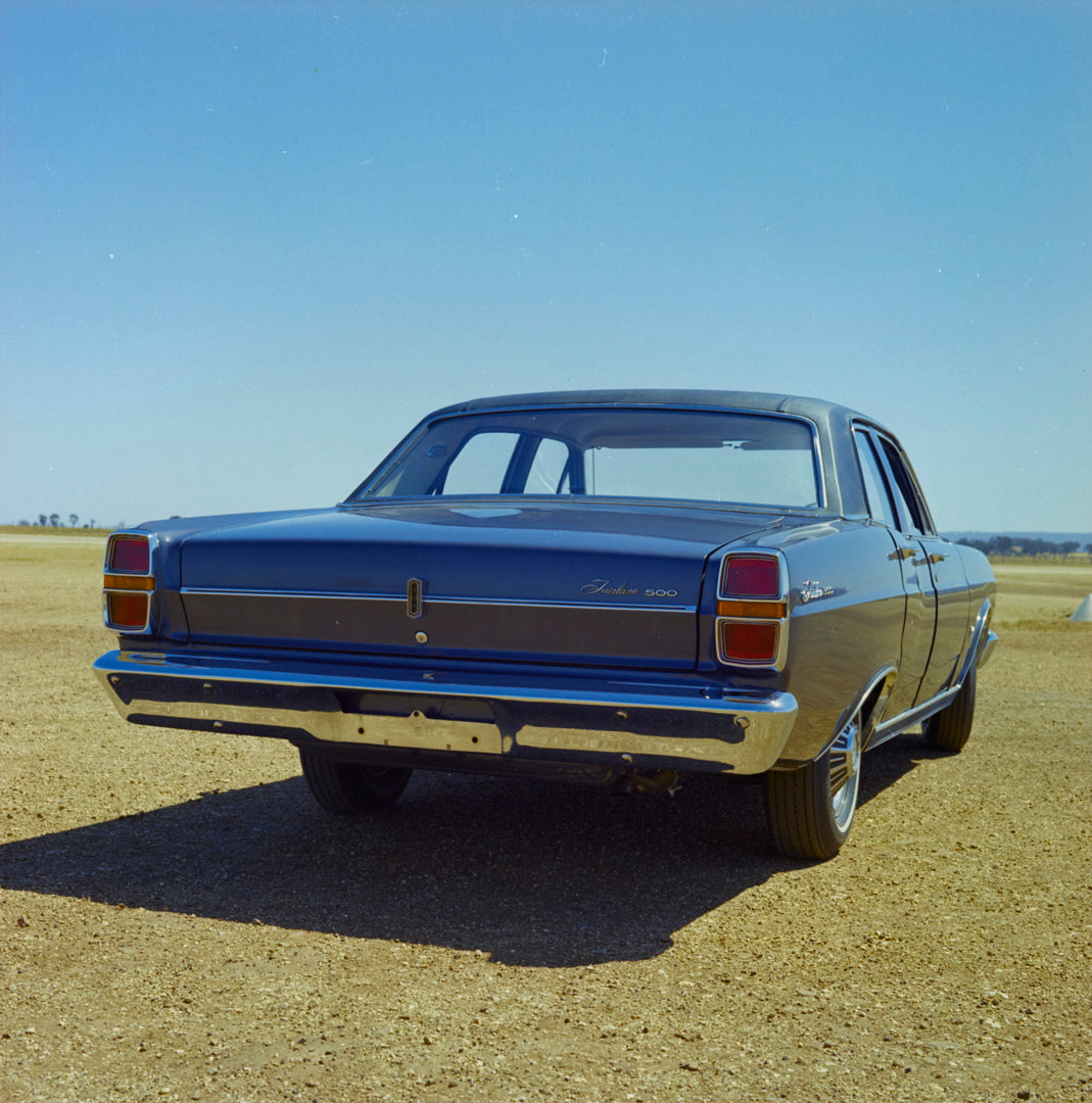 This archival image documents the 1968 Ford ZB Fairlane 500 Sedan Rear End View in Open Field FAP-2011-3 and is preserved in the Ford Heritage Vault as part of Ford Motor Company's historic photographic archive. Free for personal, non-commercial u...