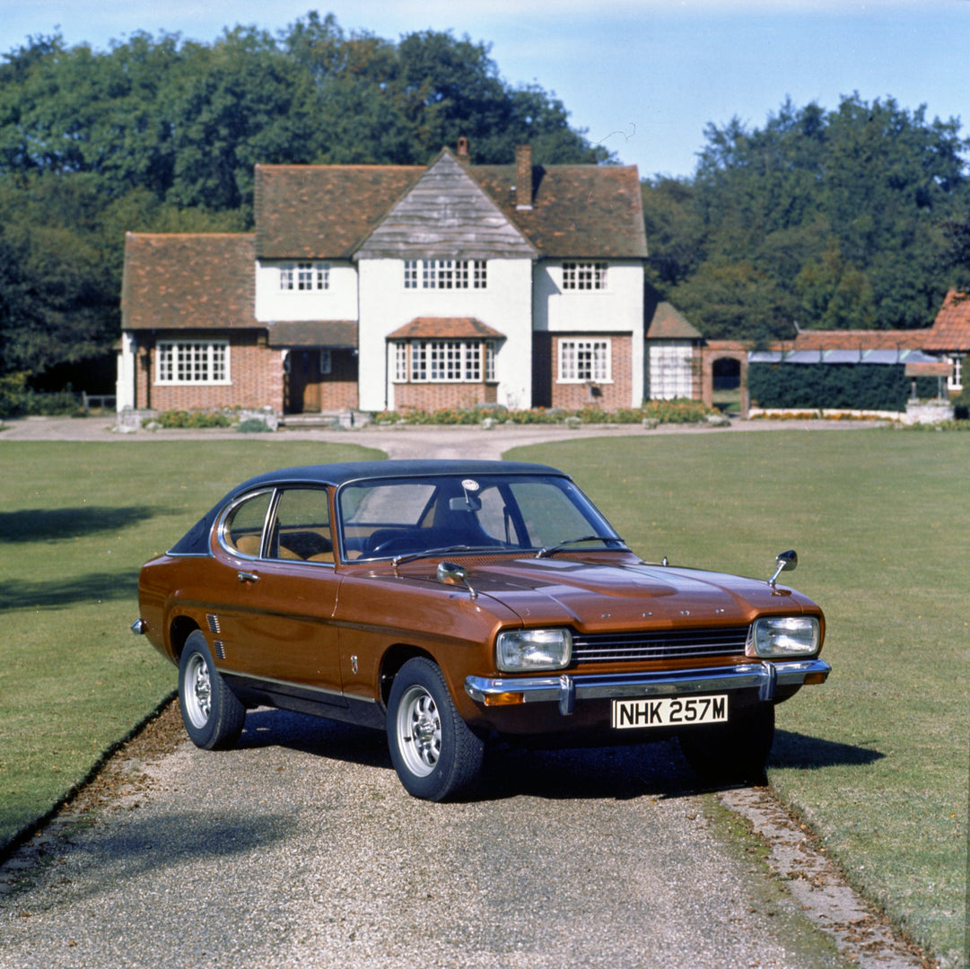 This archival image documents the 1973 Ford Capri MK I XL 1600 in front of scenic house and is preserved in the Ford Heritage Vault as part of Ford Motor Company's historic photographic archive. Free for personal, non-commercial use. Ford Heritage...