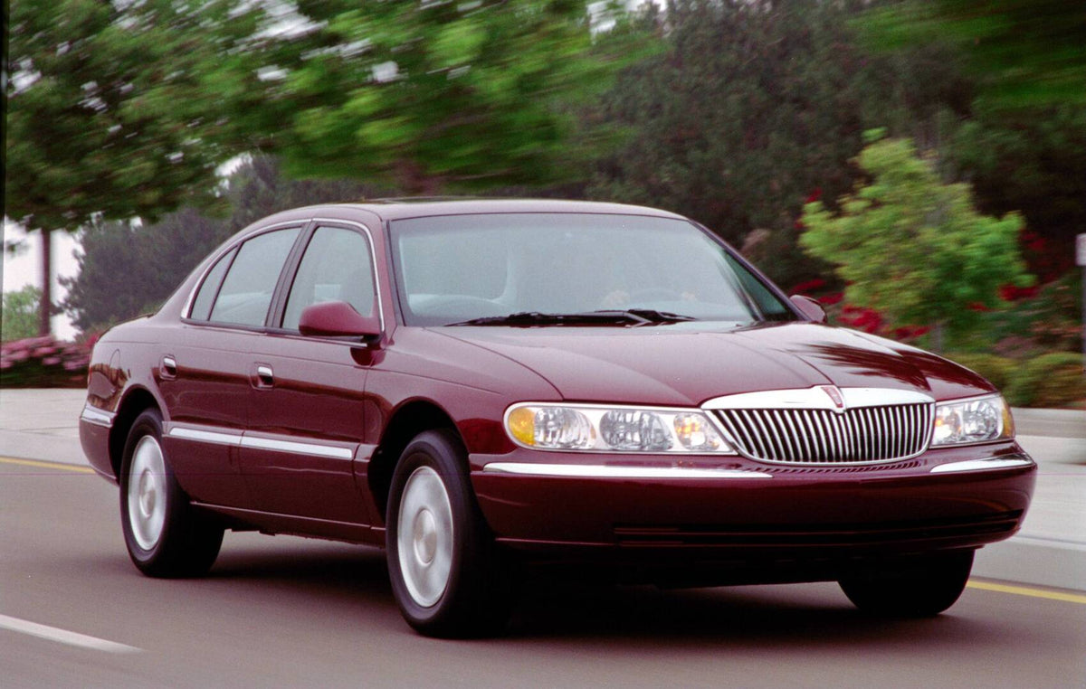 This archival image documents the 2000 Lincoln Continental AR-2002-213709 and is preserved in the Ford Heritage Vault as part of Ford Motor Company's historic photographic archive. Free for personal, non-commercial use. Ford Heritage Vault referen...