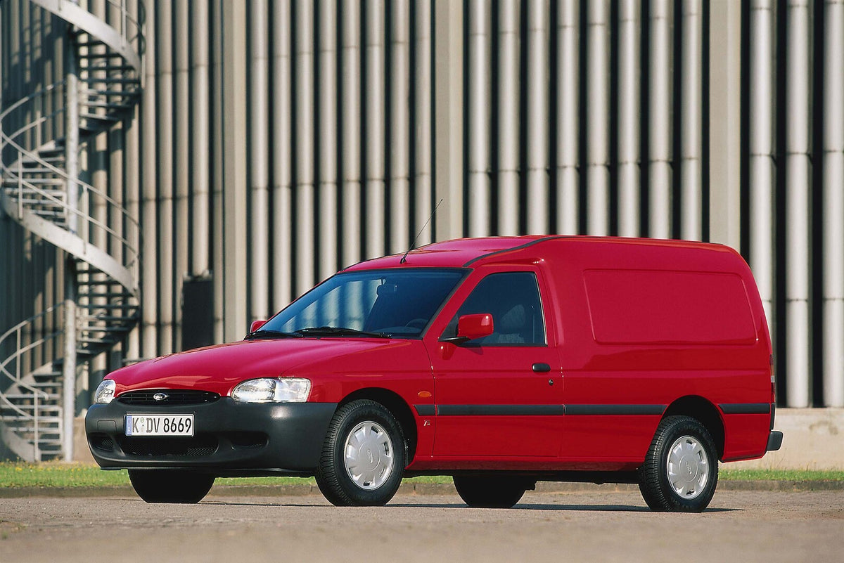 This archival image documents the 2002 Ford Escort Van Mark VI in front of scenic building and is preserved in the Ford Heritage Vault as part of Ford Motor Company's historic photographic archive. Free for personal, non-commercial use. Ford Herit...