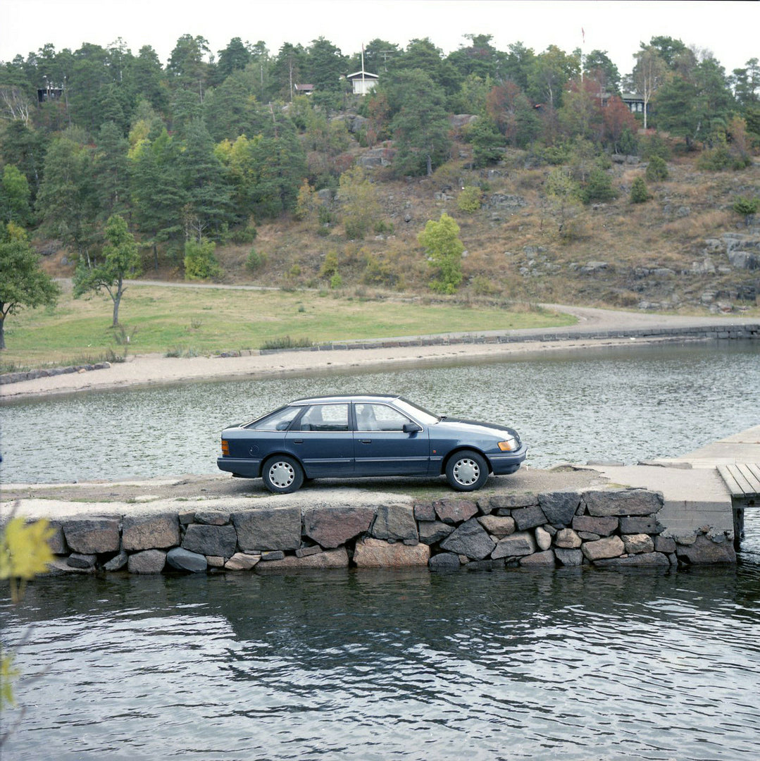 This archival image documents the 1984 Ford Scorpio Mark I GL LHD side view on scenic dock in Norway and is preserved in the Ford Heritage Vault as part of Ford Motor Company's historic photographic archive. Free for personal, non-commercial use. ...