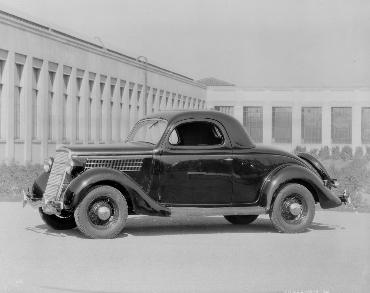 This archival image documents the 1935 Ford Three Window Coupe and is preserved in the Ford Heritage Vault as part of Ford Motor Company's historic photographic archive. Free for personal, non-commercial use. Ford Heritage Vault reference AR-2008-...