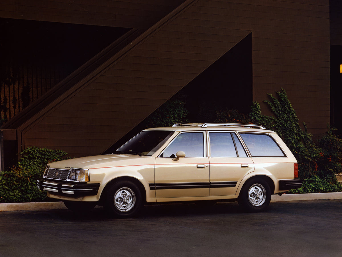 This archival image documents the 1984 Mercury Lynx GS Wagon in front of Building and is preserved in the Ford Heritage Vault as part of Ford Motor Company's historic photographic archive. Free for personal, non-commercial use. Ford Heritage Vault...