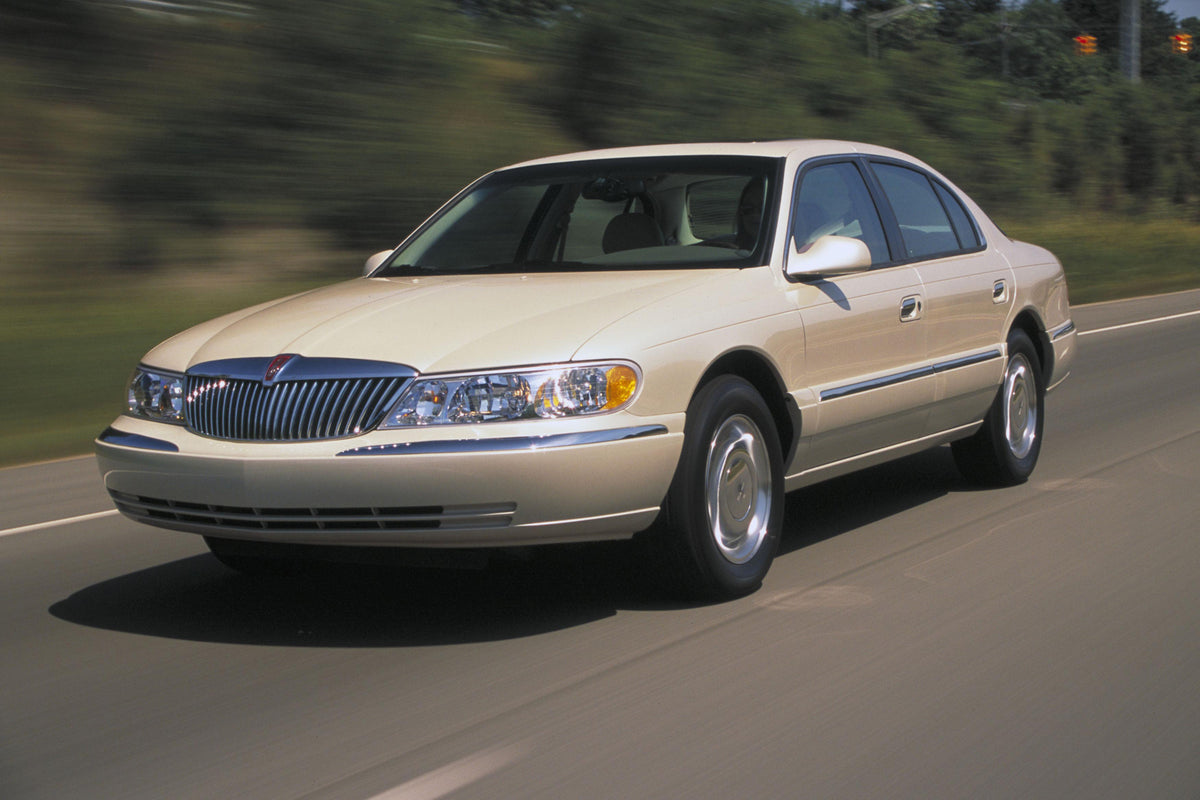 This archival image documents the 2002 Lincoln Continental 4 Door MS1675 and is preserved in the Ford Heritage Vault as part of Ford Motor Company's historic photographic archive. Free for personal, non-commercial use. Ford Heritage Vault referenc...