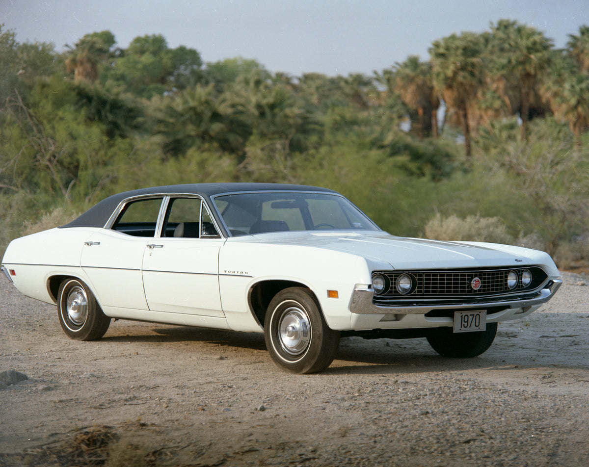 This archival image documents the 1970 Ford Torino four-door sedan scenic and is preserved in the Ford Heritage Vault as part of Ford Motor Company's historic photographic archive. Free for personal, non-commercial use. Ford Heritage Vault referen...