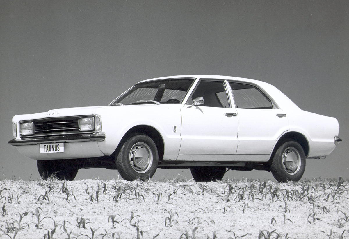This archival image documents the 1974 Ford Taunus L low view in scenic field and is preserved in the Ford Heritage Vault as part of Ford Motor Company's historic photographic archive. Free for personal, non-commercial use. Ford Heritage Vault ref...