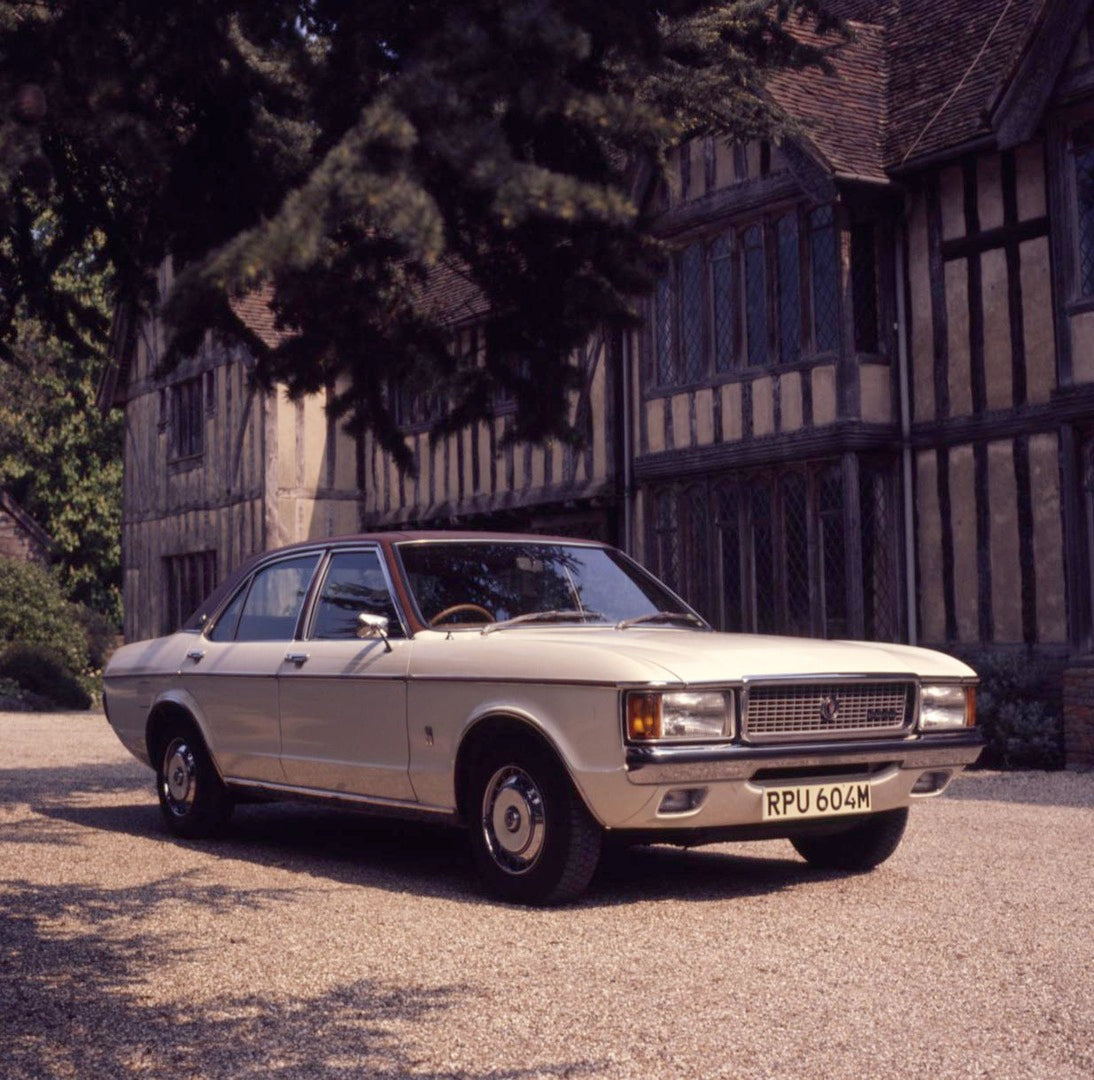 This archival image documents the 1974 Granada Mark I Ghia in front of scenic building with trees and is preserved in the Ford Heritage Vault as part of Ford Motor Company's historic photographic archive. Free for personal, non-commercial use. For...