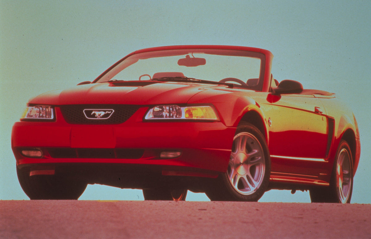 This archival image documents the 2000 Ford Mustang with scenic blue sky MS597443 and is preserved in the Ford Heritage Vault as part of Ford Motor Company's historic photographic archive. Free for personal, non-commercial use. Ford Heritage Vault...