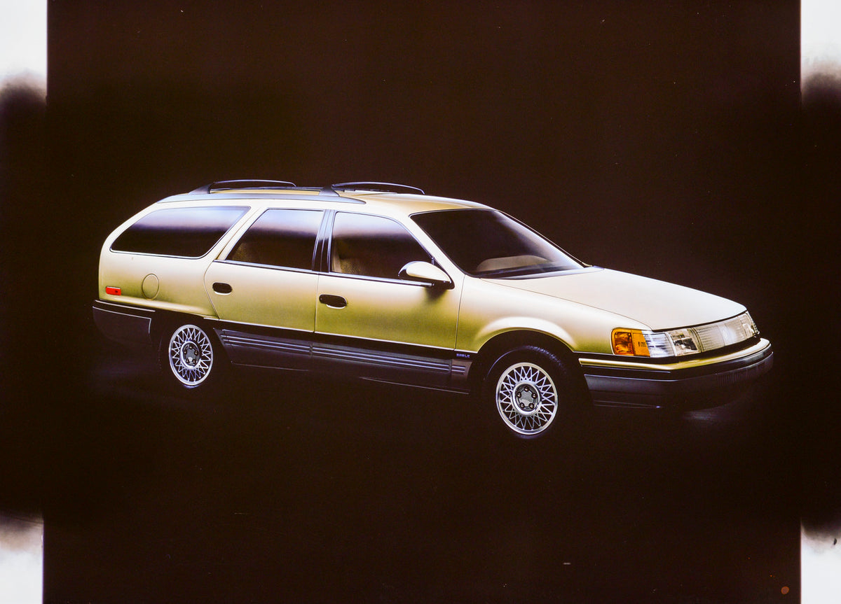This archival image documents the 1986 Mercury Sable station wagon and is preserved in the Ford Heritage Vault as part of Ford Motor Company's historic photographic archive. Free for personal, non-commercial use. Ford Heritage Vault reference AR-2...