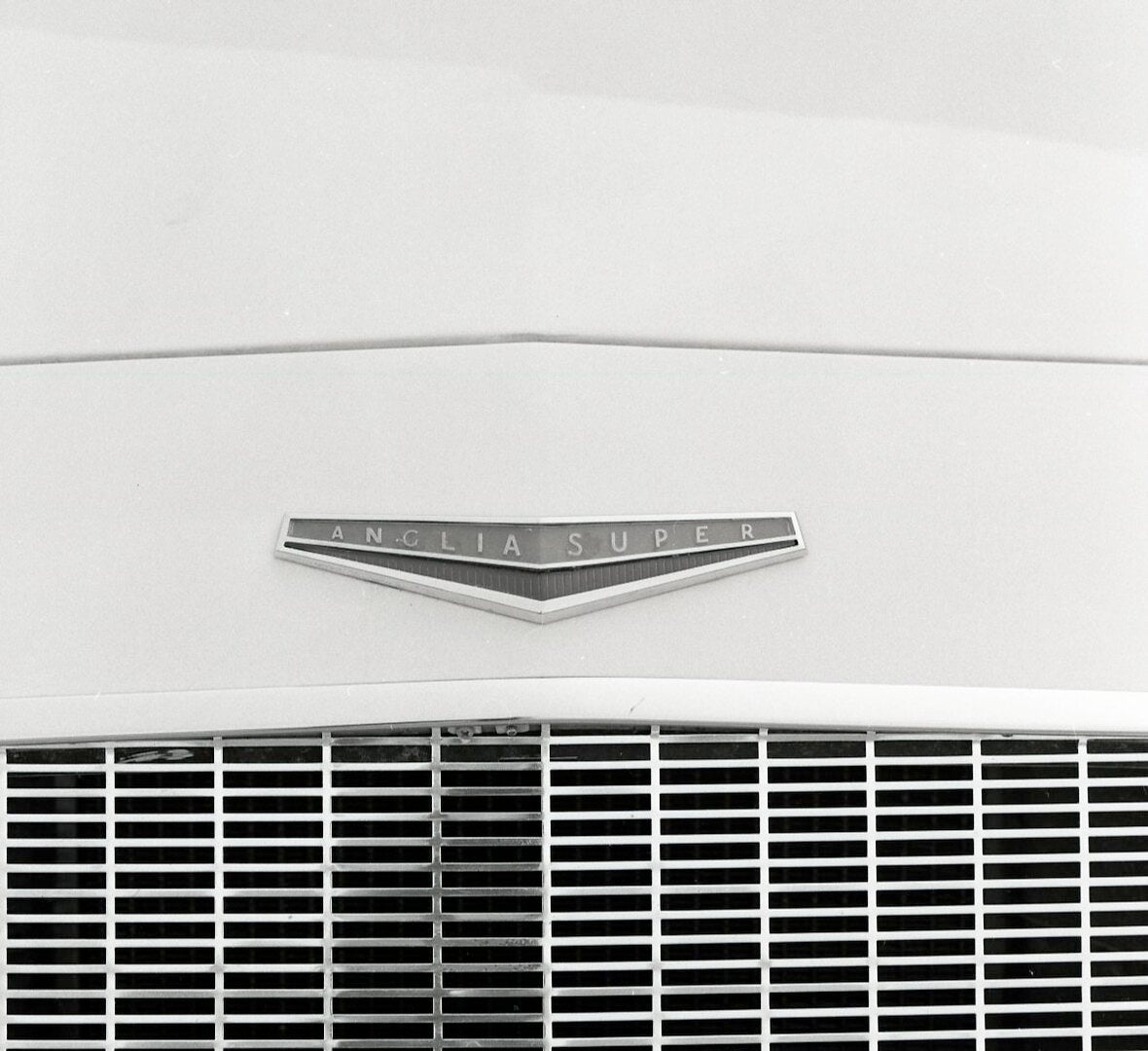 This archival image documents the 1963 Ford Anglia Super badge closeup and is preserved in the Ford Heritage Vault as part of Ford Motor Company's historic photographic archive. Free for personal, non-commercial use. Ford Heritage Vault reference ...