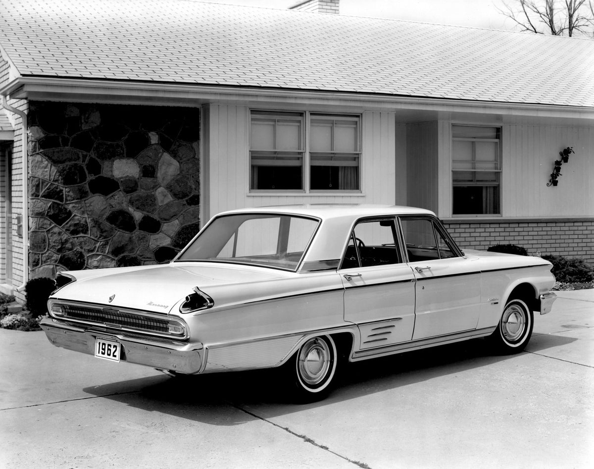 This archival image documents the 1962 Mercury Meteor Sedan rear view in scenic driveway AR-2007-5 and is preserved in the Ford Heritage Vault as part of Ford Motor Company's historic photographic archive. Free for personal, non-commercial use. Fo...