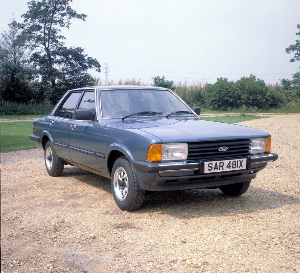 This archival image documents the 1981 Ford Cortina MK V front 3/4 view scenic and is preserved in the Ford Heritage Vault as part of Ford Motor Company's historic photographic archive. Free for personal, non-commercial use. Ford Heritage Vault re...