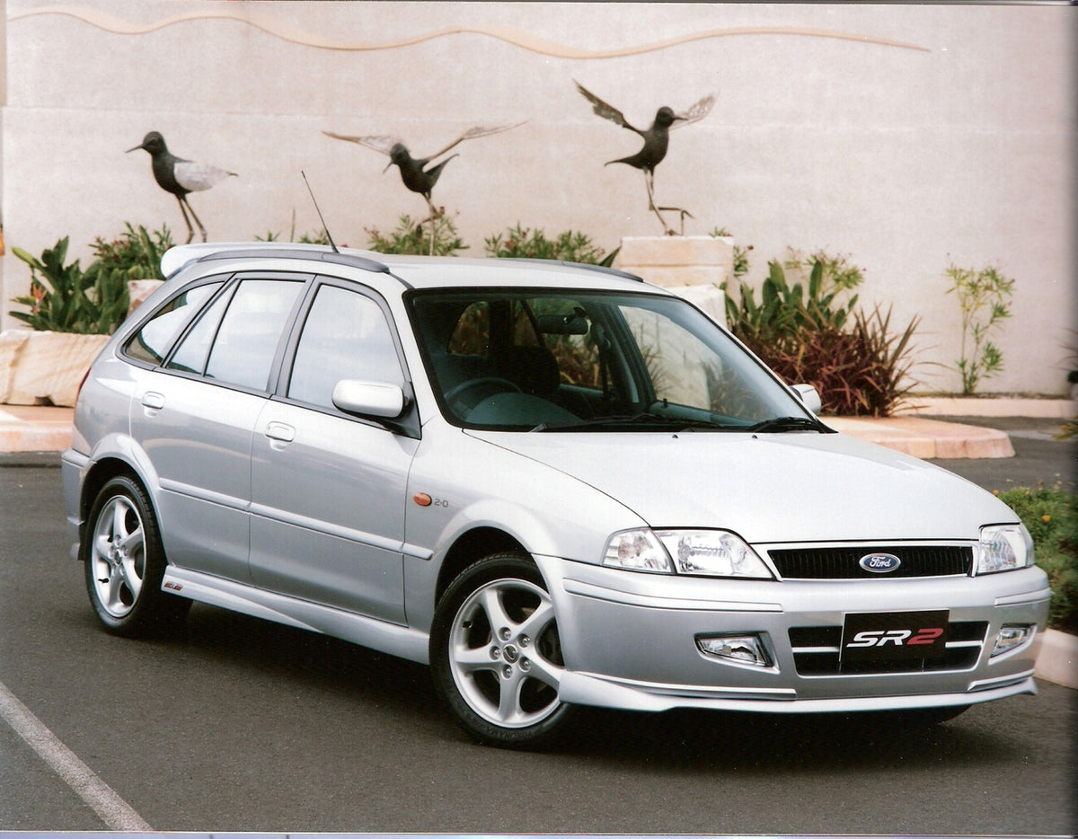 This archival image documents the 2001 Ford Laser SR2 in scenic parking lot with birds and is preserved in the Ford Heritage Vault as part of Ford Motor Company's historic photographic archive. Free for personal, non-commercial use. Ford Heritage ...