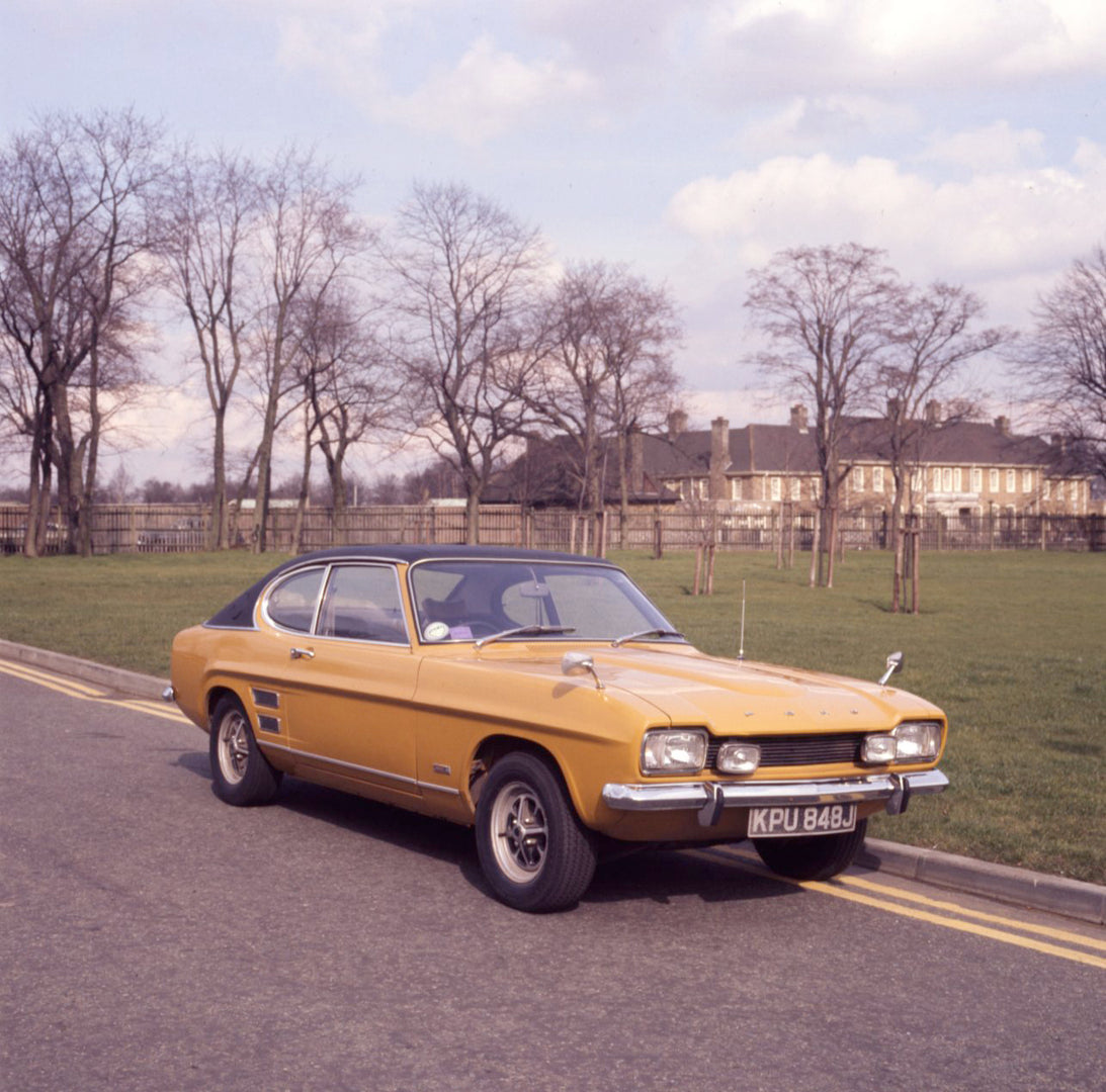This archival image documents the 1971 Ford Capri MK I 3000E on scenic road and is preserved in the Ford Heritage Vault as part of Ford Motor Company's historic photographic archive. Free for personal, non-commercial use. Ford Heritage Vault refer...