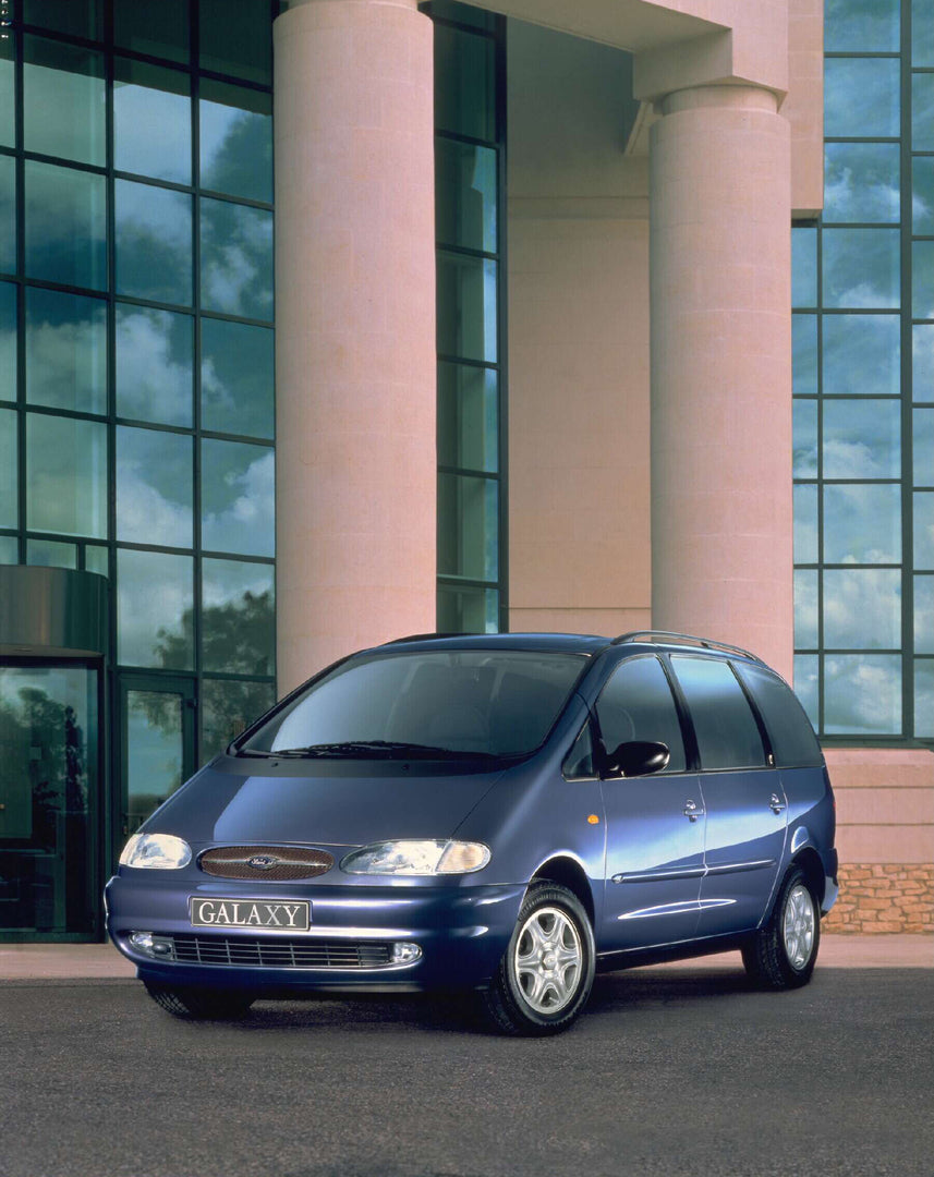 This archival image documents the 1995 Ford Galaxy Mark I Ghia in front of building with pillars AR-2002-213709 and is preserved in the Ford Heritage Vault as part of Ford Motor Company's historic photographic archive. Free for personal, non-comme...