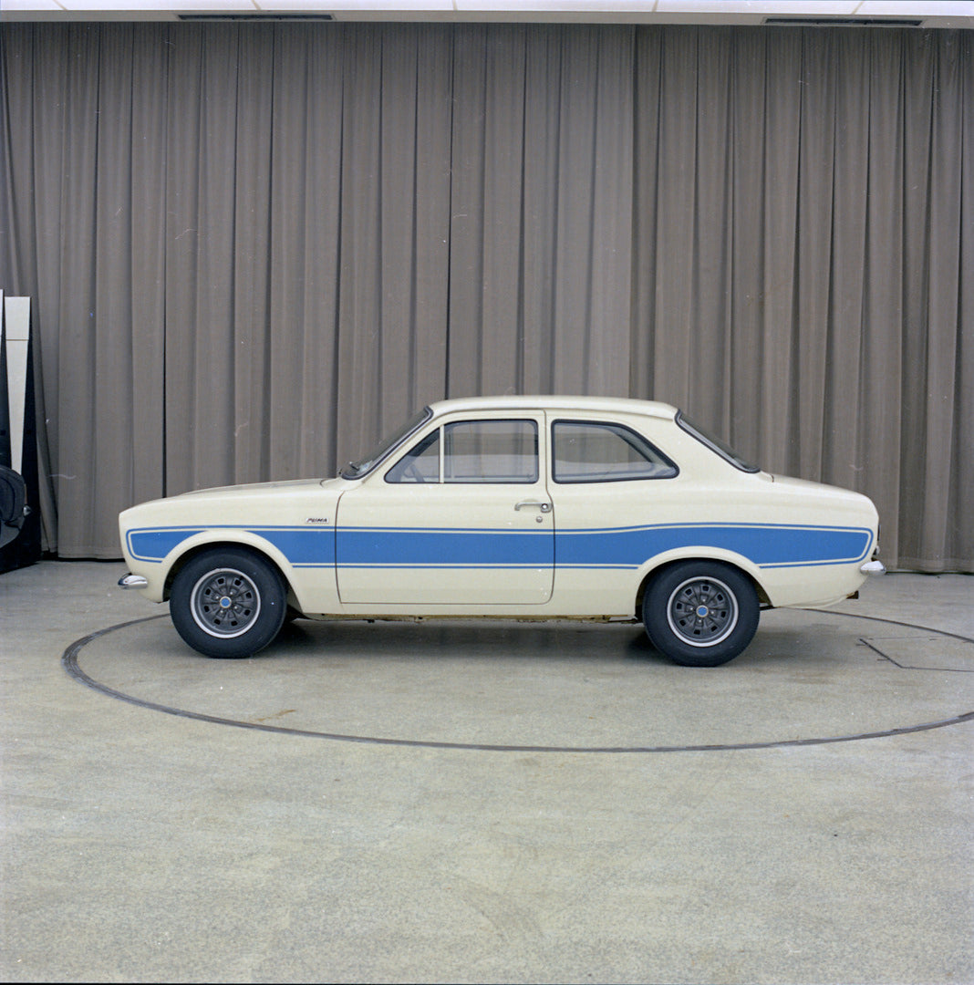 This archival image documents the 1972 Ford Escort Mark I RS2000 Dunton Design side view in showroom 1972-1376-6 and is preserved in the Ford Heritage Vault as part of Ford Motor Company's historic photographic archive. Free for personal, non-comm...