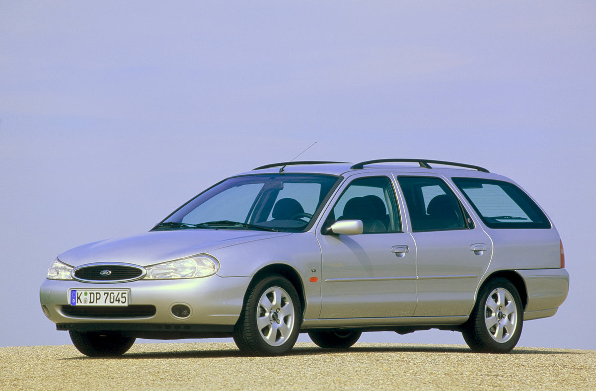 This archival image documents the 1997 Ford Mondeo Mark II with scenic blue sky and is preserved in the Ford Heritage Vault as part of Ford Motor Company's historic photographic archive. Free for personal, non-commercial use. Ford Heritage Vault r...