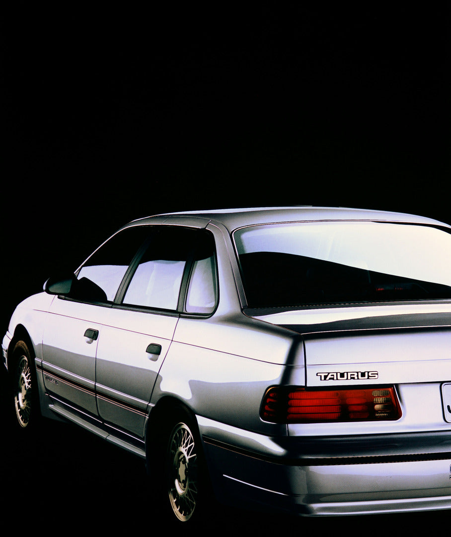 This archival image documents the 1989 Ford Taurus four-door and is preserved in the Ford Heritage Vault as part of Ford Motor Company's historic photographic archive. Free for personal, non-commercial use. Ford Heritage Vault reference AR-2001-94...