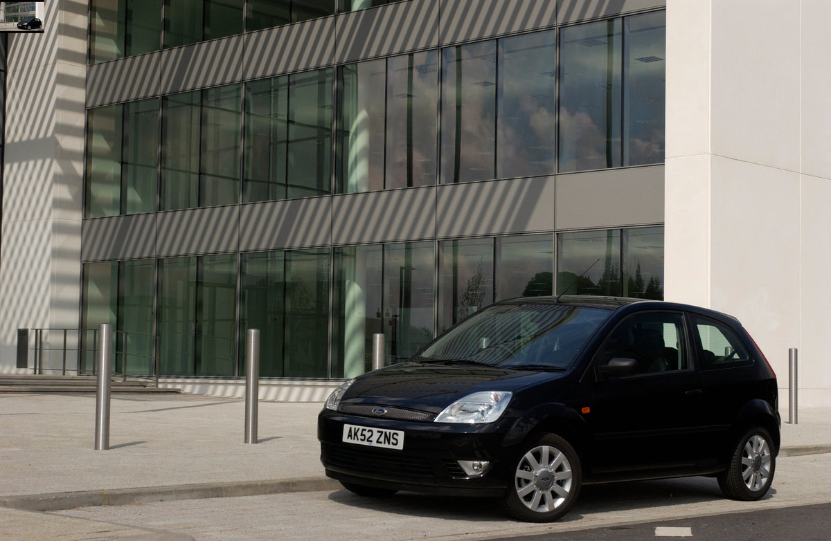 This archival image documents the 2003 Ford Fiesta Mark VI in front of scenic building and is preserved in the Ford Heritage Vault as part of Ford Motor Company's historic photographic archive. Free for personal, non-commercial use. Ford Heritage ...