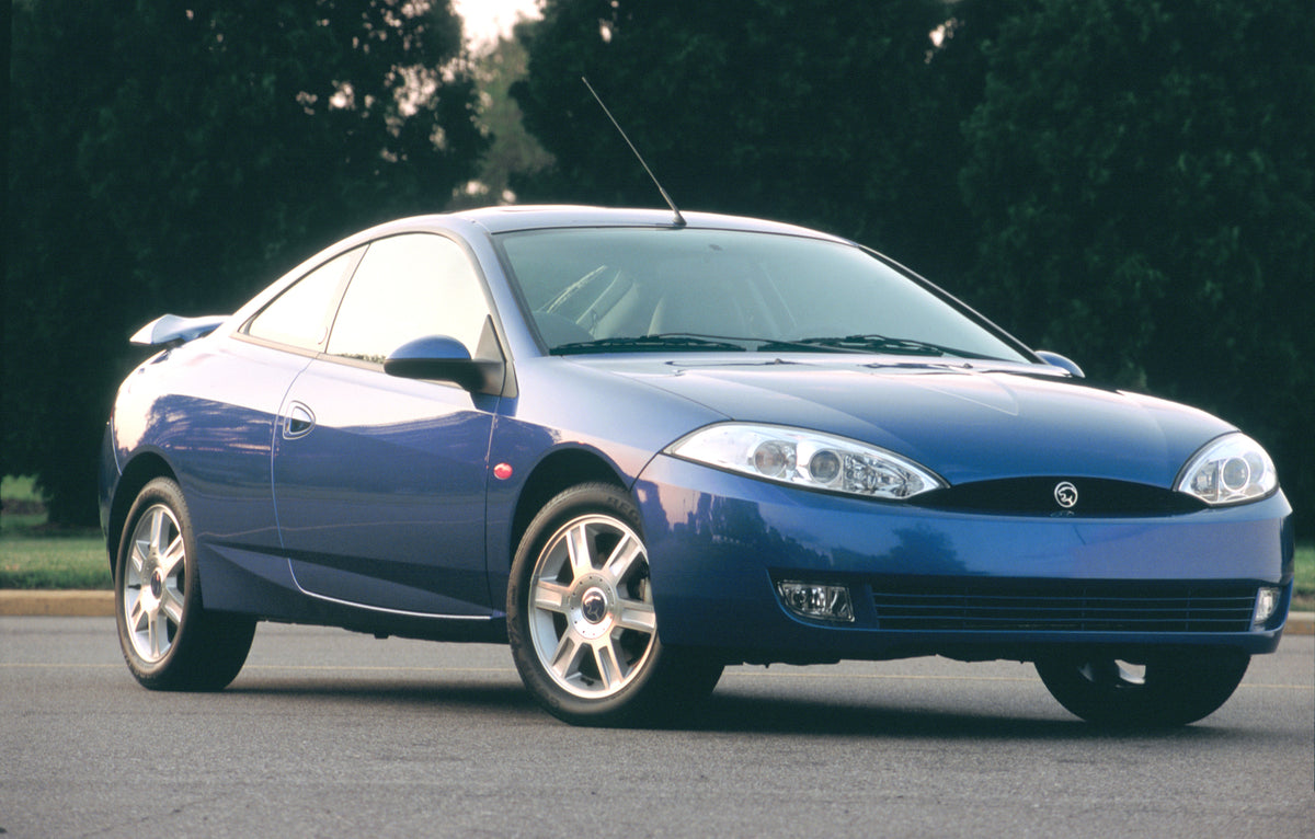This archival image documents the 2001 Mercury Cougar and is preserved in the Ford Heritage Vault as part of Ford Motor Company's historic photographic archive. Free for personal, non-commercial use. Ford Heritage Vault reference AR-2008-8.1.11.569.