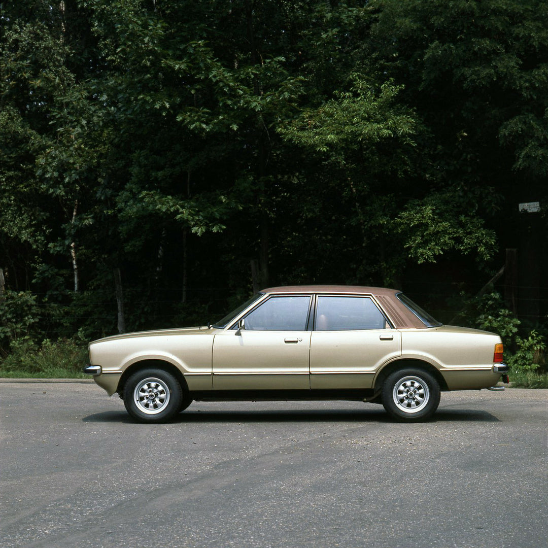 This archival image documents the 1978 Ford Taunus LHD side view with scenic trees in Genk and is preserved in the Ford Heritage Vault as part of Ford Motor Company's historic photographic archive. Free for personal, non-commercial use. Ford Herit...