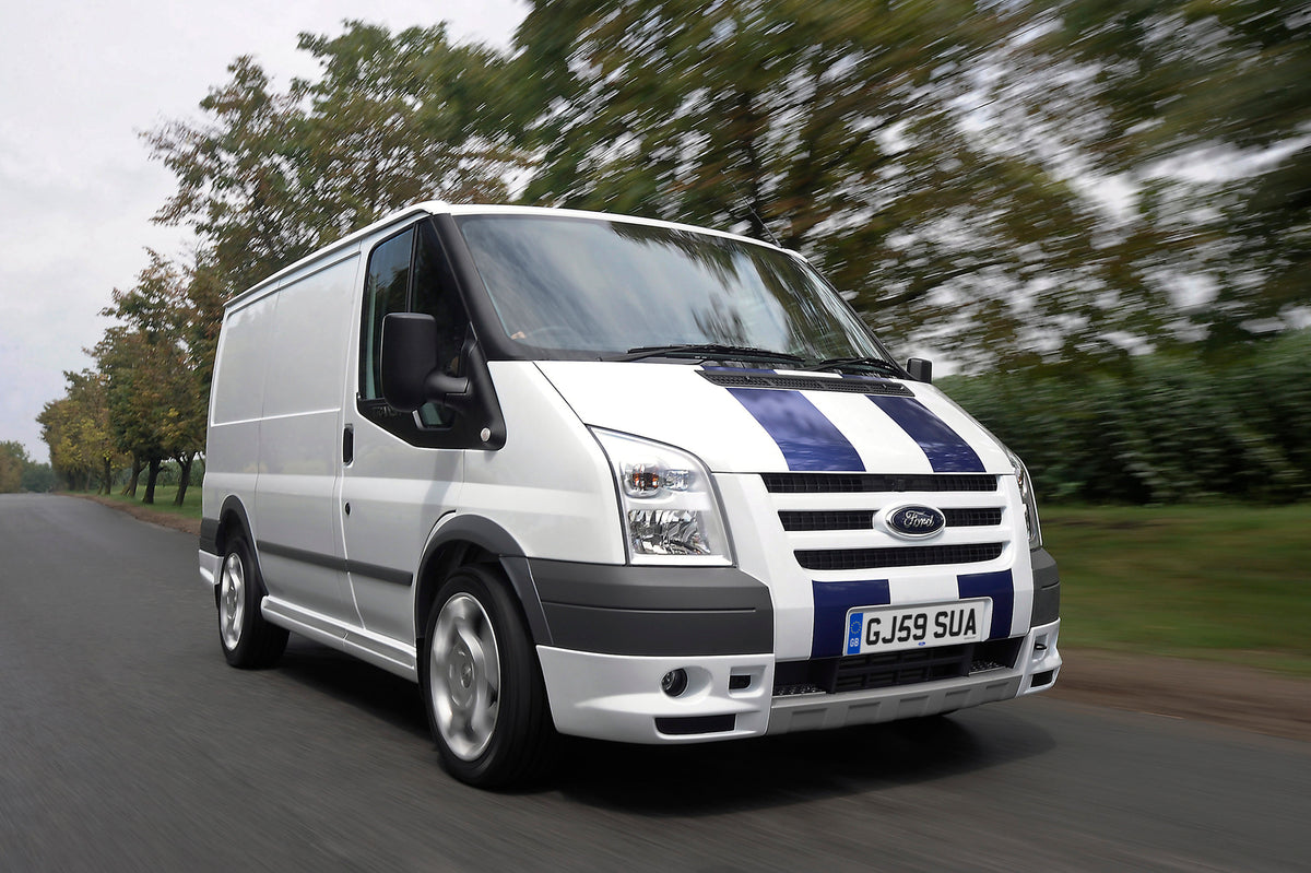 This archival image documents the 2009 Transit Mark IV SportVan action shot on scenic road with trees and is preserved in the Ford Heritage Vault as part of Ford Motor Company's historic photographic archive. Free for personal, non-commercial use....