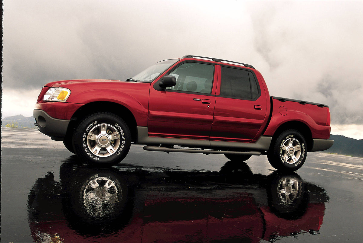 This archival image documents the 2004 Ford Explorer Sport Trac and is preserved in the Ford Heritage Vault as part of Ford Motor Company's historic photographic archive. Free for personal, non-commercial use. Ford Heritage Vault reference AR-2008...