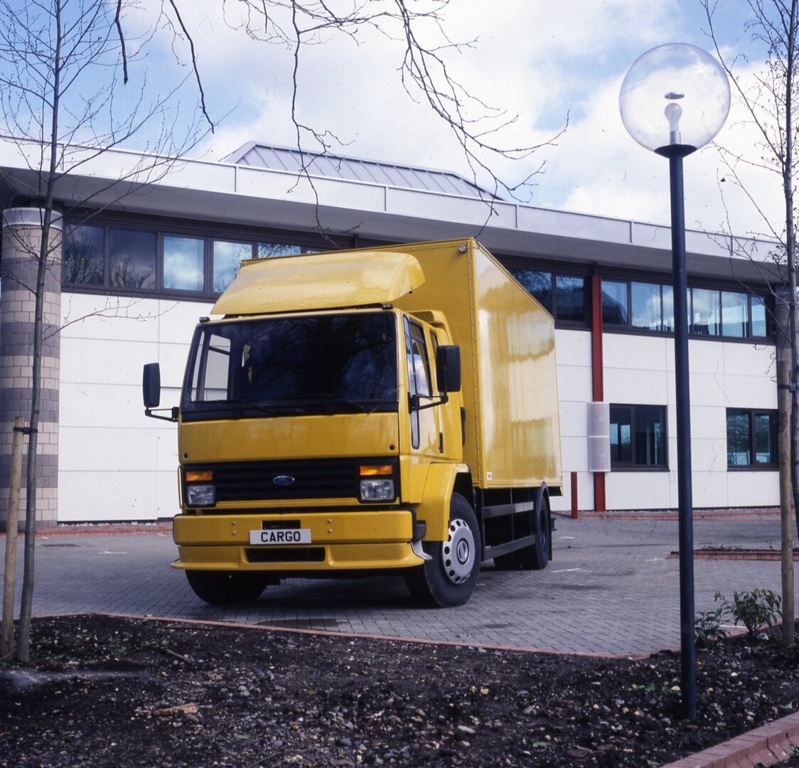 This archival image documents the 1988 Ford Cargo LHD 1628 Draw Bar Unit in front of building and is preserved in the Ford Heritage Vault as part of Ford Motor Company's historic photographic archive. Free for personal, non-commercial use. Ford He...